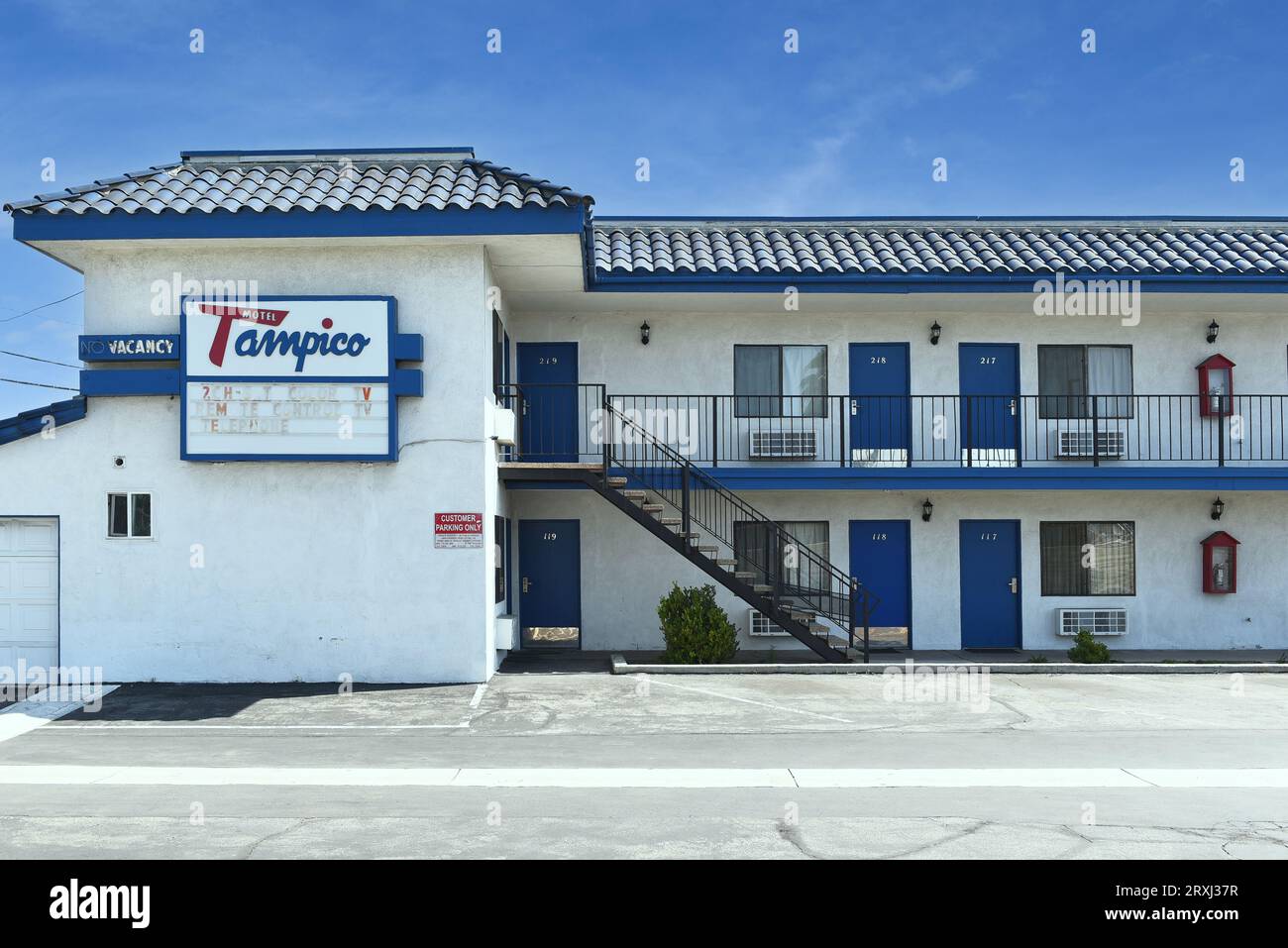 ANAHEIM, CALIFORNIA - 24 SEPT 2023: sign and rooms at the Tampico Motel on State College Blvd, currently closed while undergoing renovations. Stock Photo