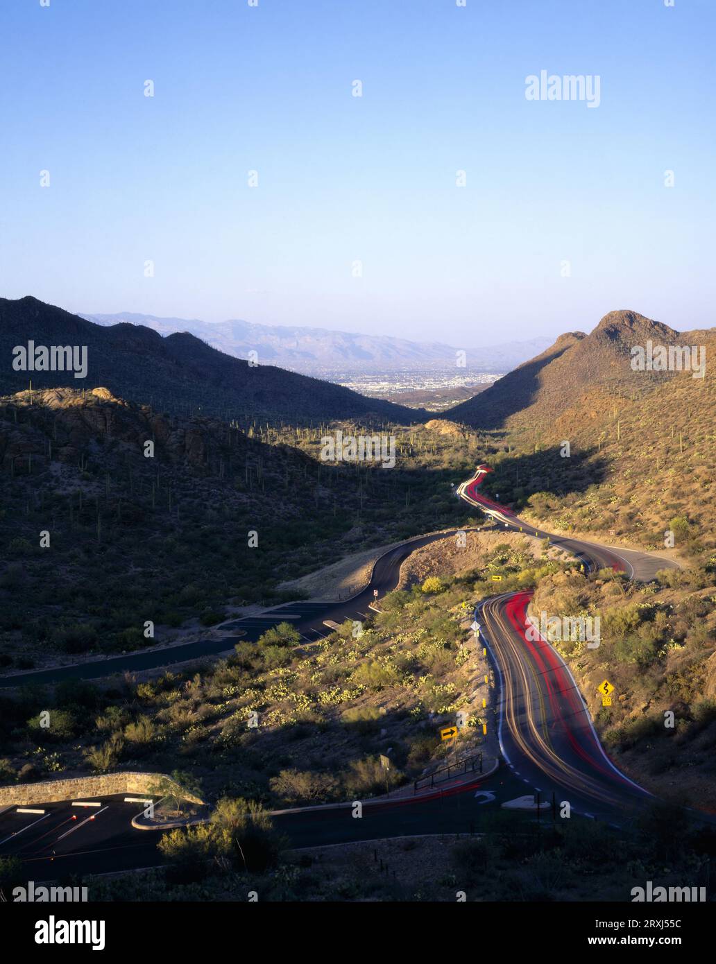 Cars travel along Gates Pass Road on the west side of Tucson, Arizona. Stock Photo