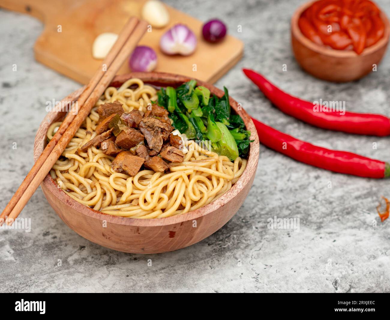 Indonesian chicken noodles called mie ayam topped with chicken meat and