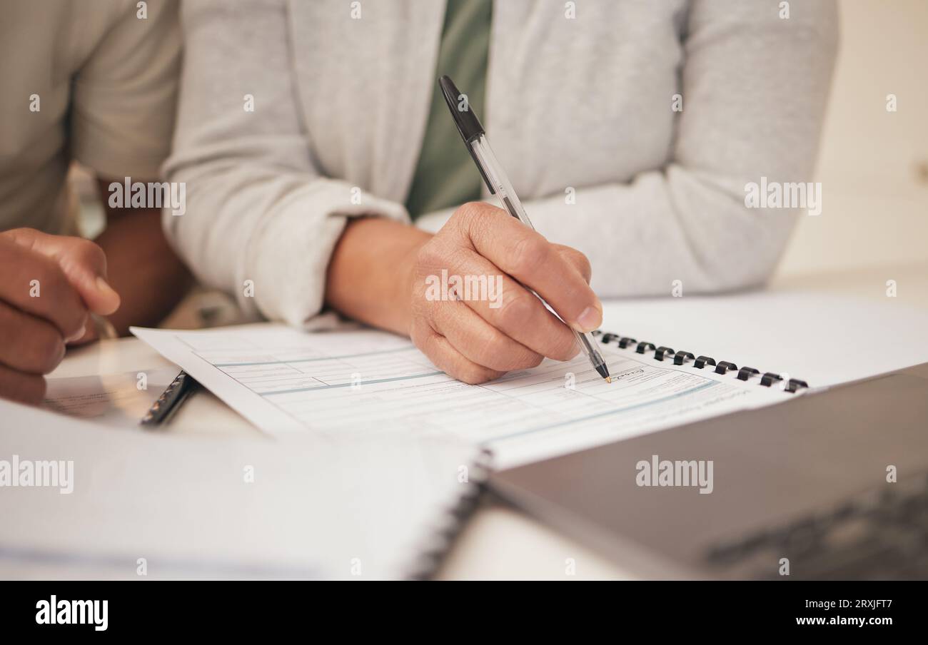 Business couple writing in documents hi-res stock photography and ...
