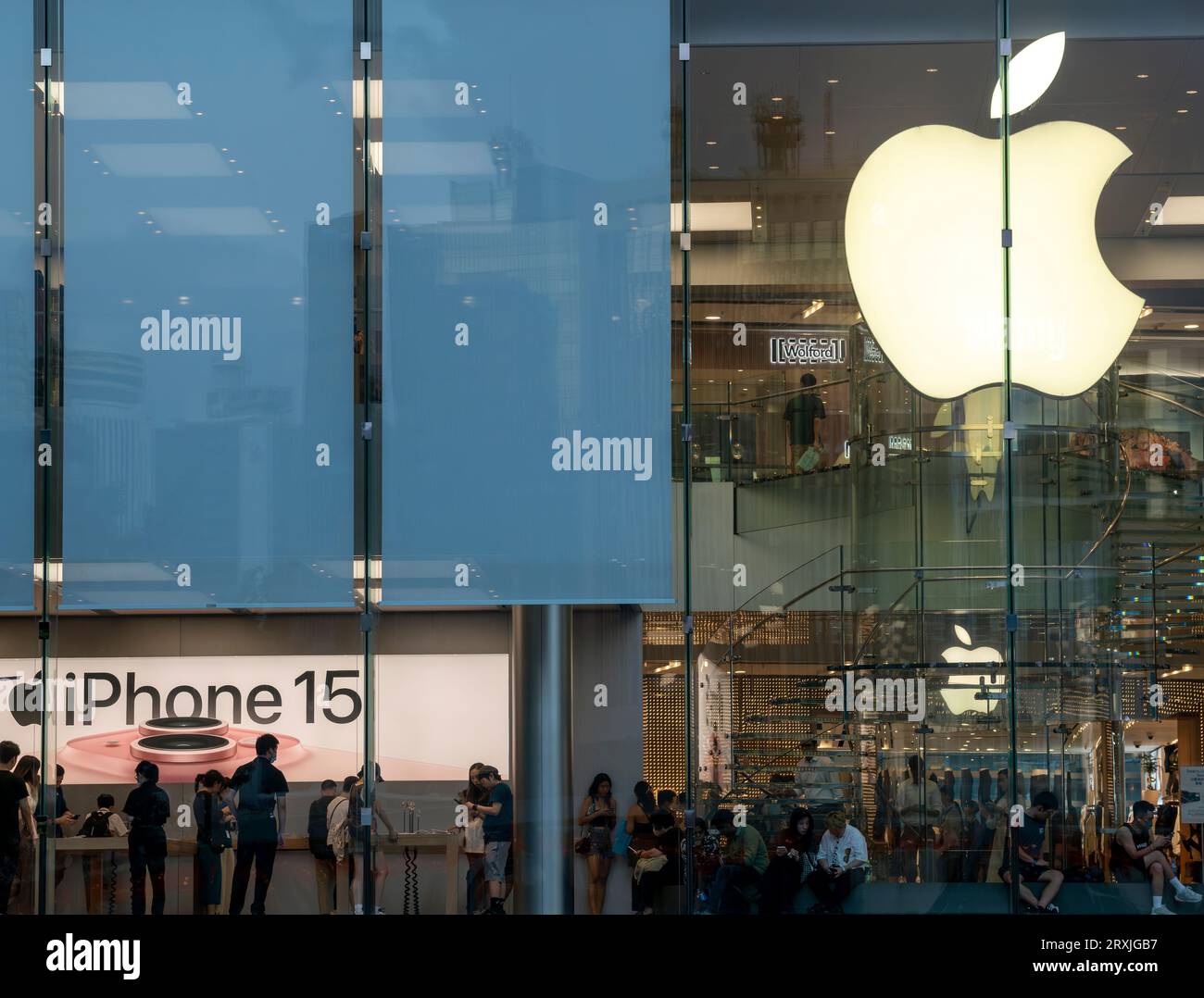 People buying the new Apple iphone 15 at the Hong Kong Apple store in central, Hong Kong, China. Stock Photo