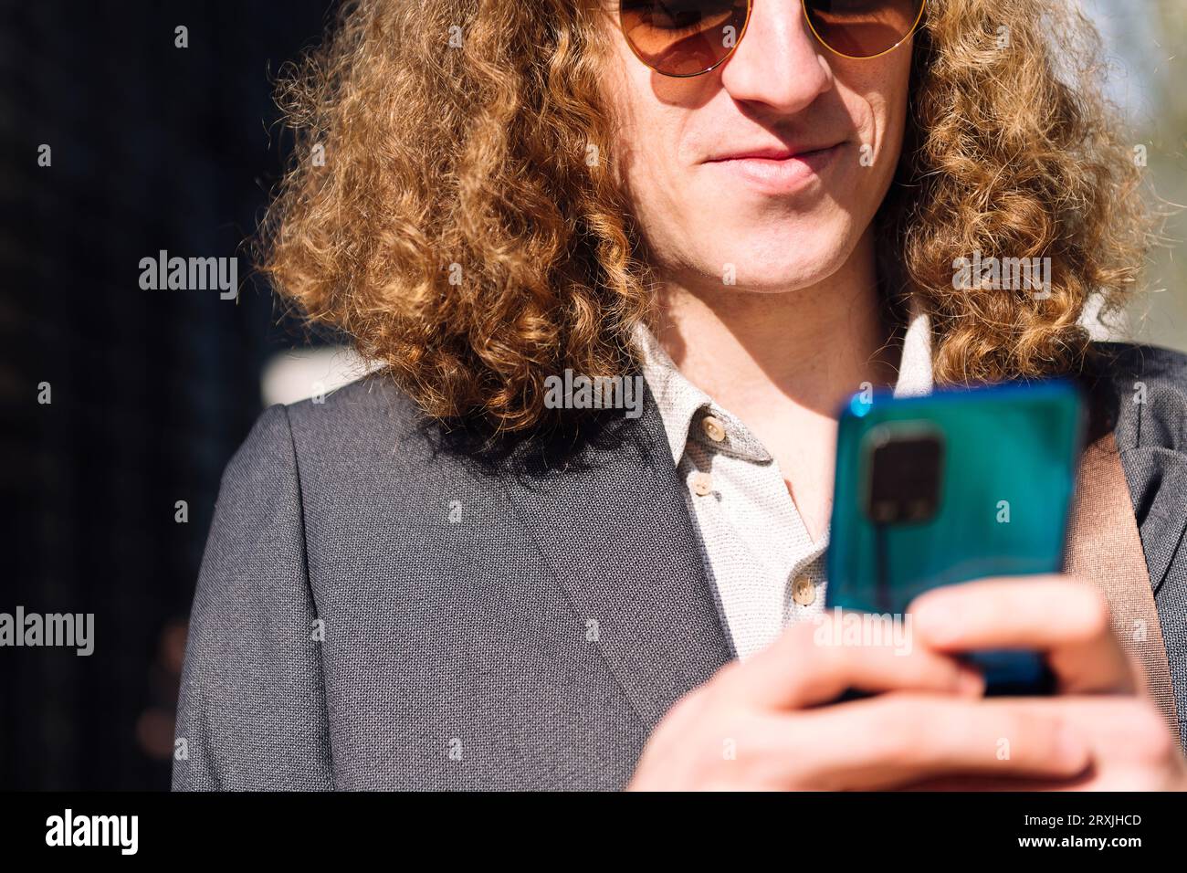 young entrepreneur man using mobile phone Stock Photo
