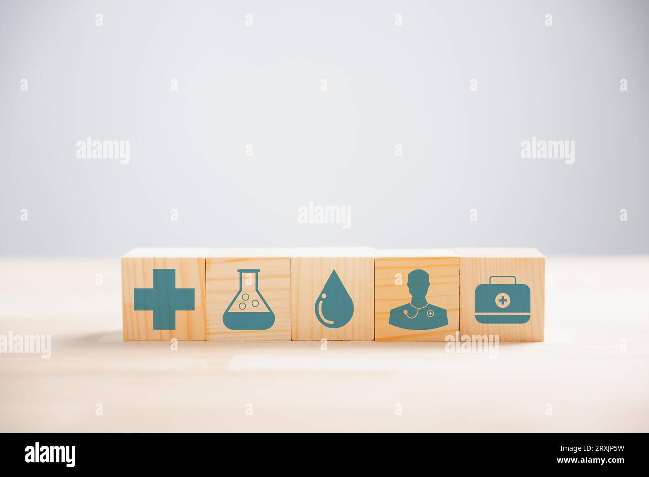 wooden cubes with different icons Stock Photo - Alamy