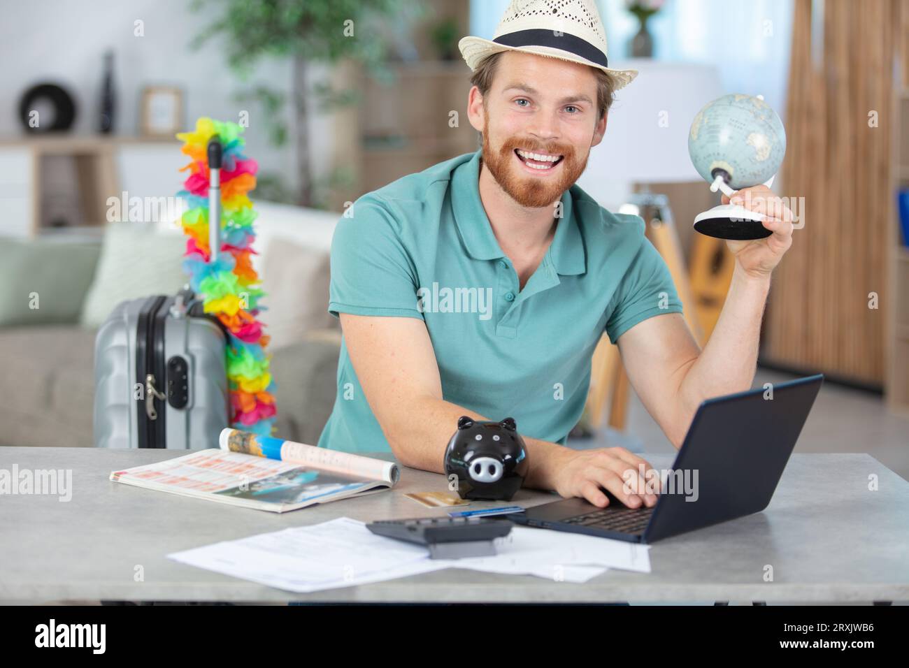 young man consulting with online travel agent Stock Photo
