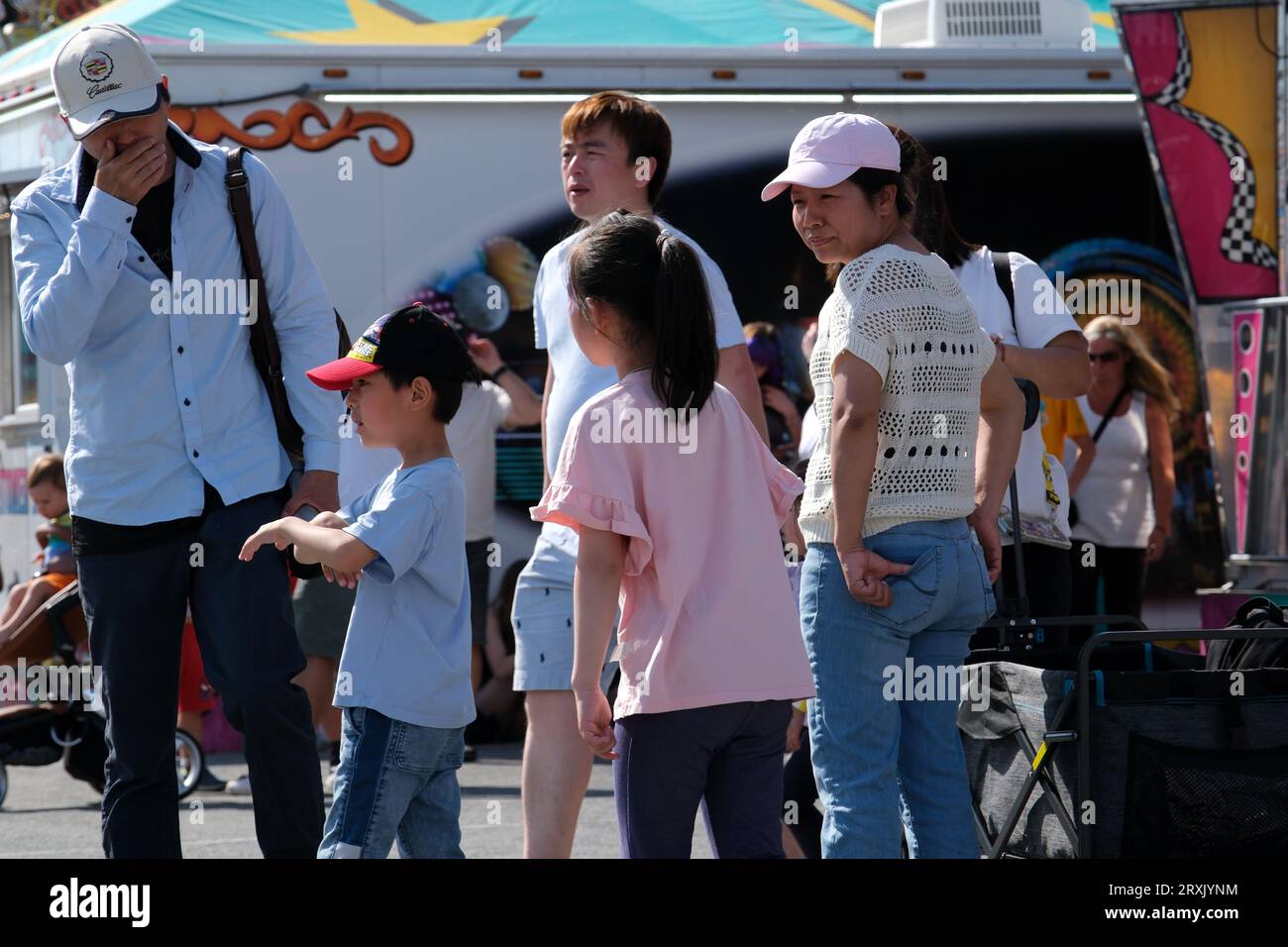 Surry Rodeo Rides day off people in Vancouver buy drinks ride on swings rides wear cowboy ...