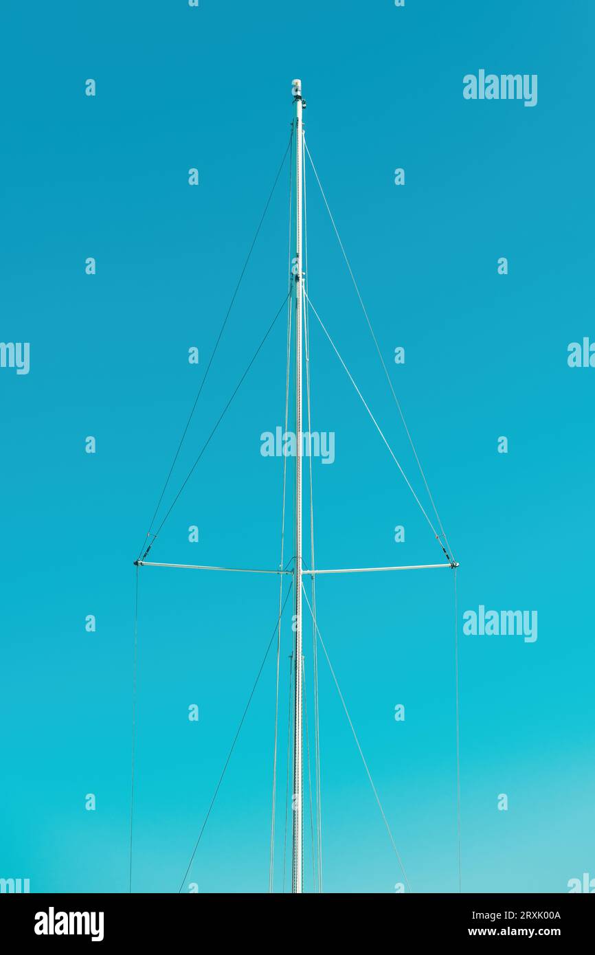 Standing rigging of a boat mast against blue sky Stock Photo Alamy