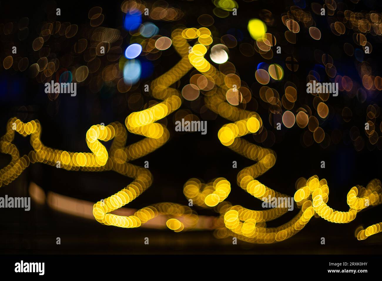 Blurred holiday background with bokeh. Defocused New Year and Christmas ...