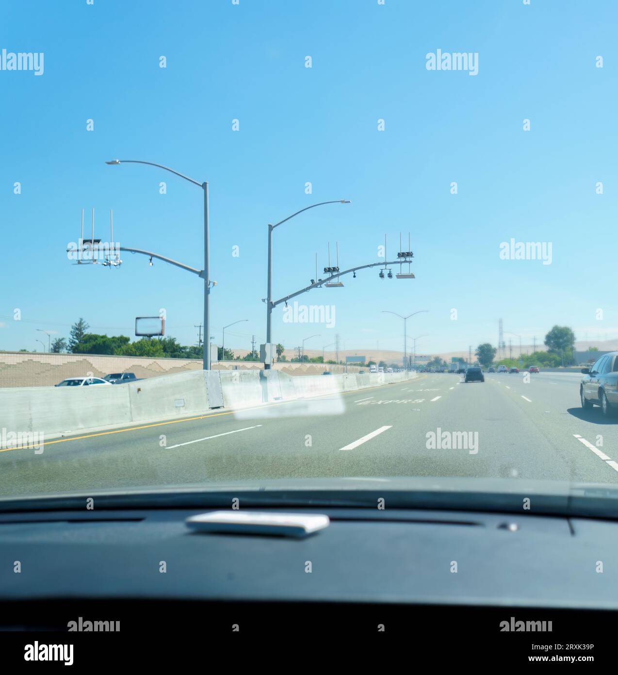 Traffic monitoring security camera CCTV on Express line. California