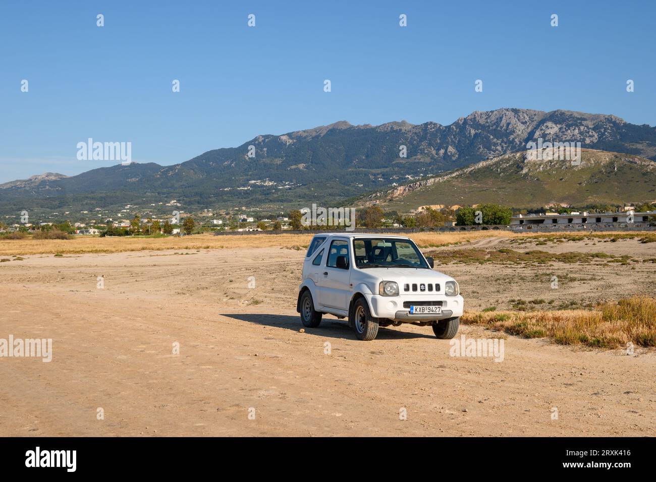 Kos, Greece - May 8, 2023: Suzuki Jimny parked on the gravel road. Kos island. Greece Stock Photo
