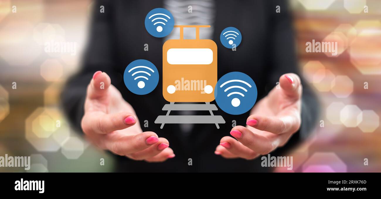 Smart train concept above the hands of a woman in background Stock ...