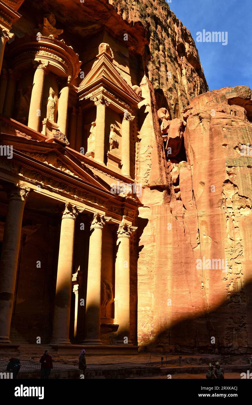 A different angle of the world famous Treasury in the ancient city of Petra, Jordan, as morning sun started to shine into the narrow passageway Stock Photo