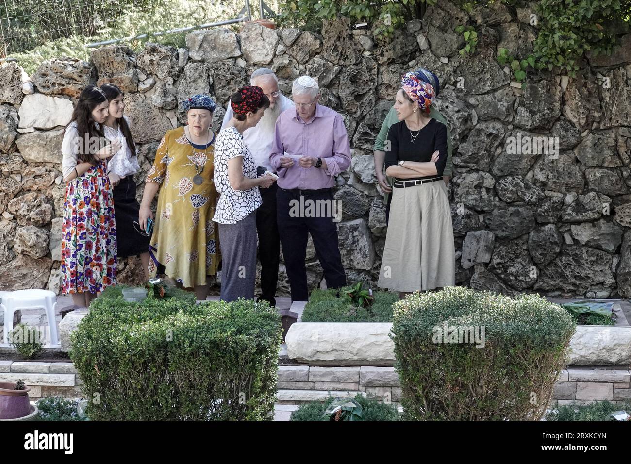 Jerusalem, Israel. 26th Sep, 2023. Bereaved families visit the graves of their loved ones as Israel commemorates its 2,689 fallen servicemen in the 1973 Yom Kippur, October War, on the 50th anniversary at a State Memorial Ceremony in the National Memorial Hall at the Mt. Herzl Military Cemetery. Credit: Nir Alon/Alamy Live News Stock Photo
