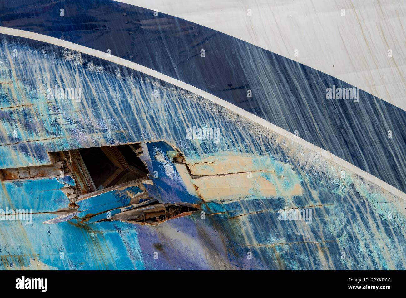 hole in fibreglass hull of large boat or yacht below the waterline