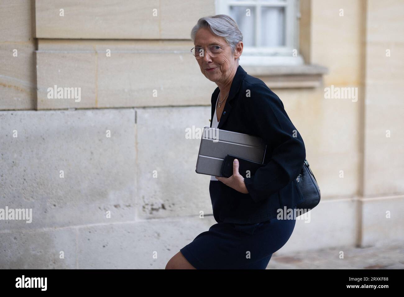 French Prime Minister Elisabeth Borne arrives for a meeting with president of the group Gauche democrate et republicaine and the general secretary of the French Communist Party (PCF) to discuss the issues facing the new parliamentary term, at Matignon in Paris on September 26, 2023. Photo by Raphael Lafargue/ABACAPRESS.COM Stock Photo