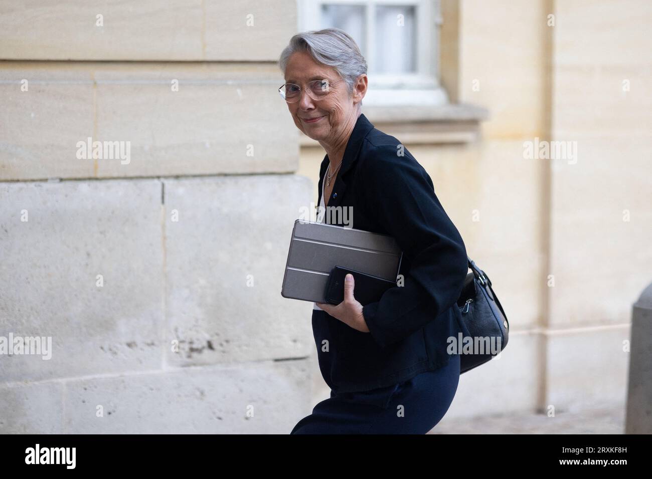 French Prime Minister Elisabeth Borne arrives for a meeting with president of the group Gauche democrate et republicaine and the general secretary of the French Communist Party (PCF) to discuss the issues facing the new parliamentary term, at Matignon in Paris on September 26, 2023. Photo by Raphael Lafargue/ABACAPRESS.COM Stock Photo