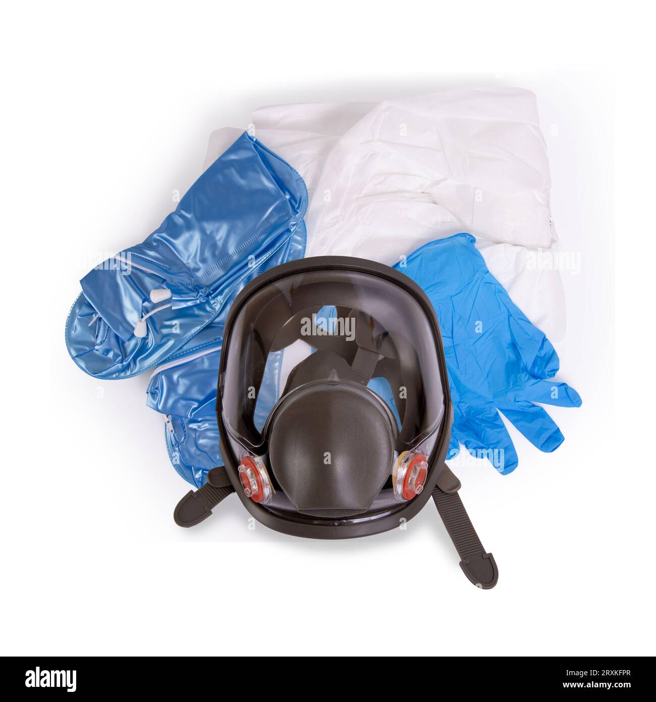 Top view of pollution protection suit , full face mask, clothing, gloves and shoes on white background. Stock Photo