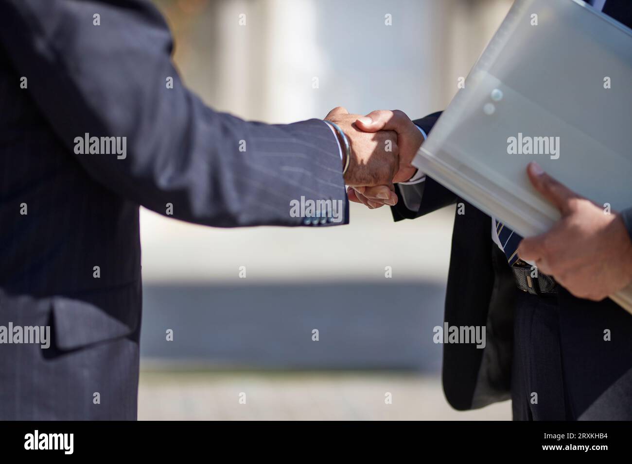 Hands of businessmen shaking hands Stock Photo