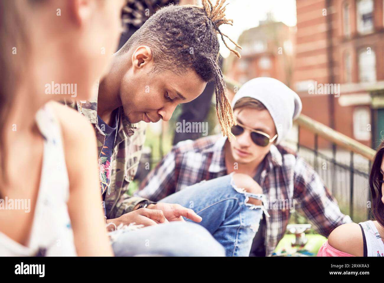 Boy boys male girl girls female friends looking hi-res stock ...
