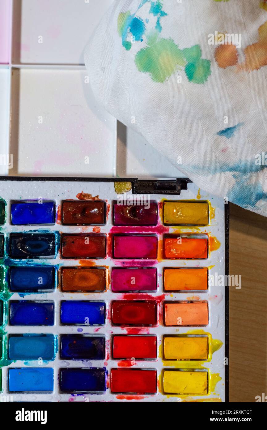 watercolor paint palette paint spots on white cloth Stock Photo Alamy