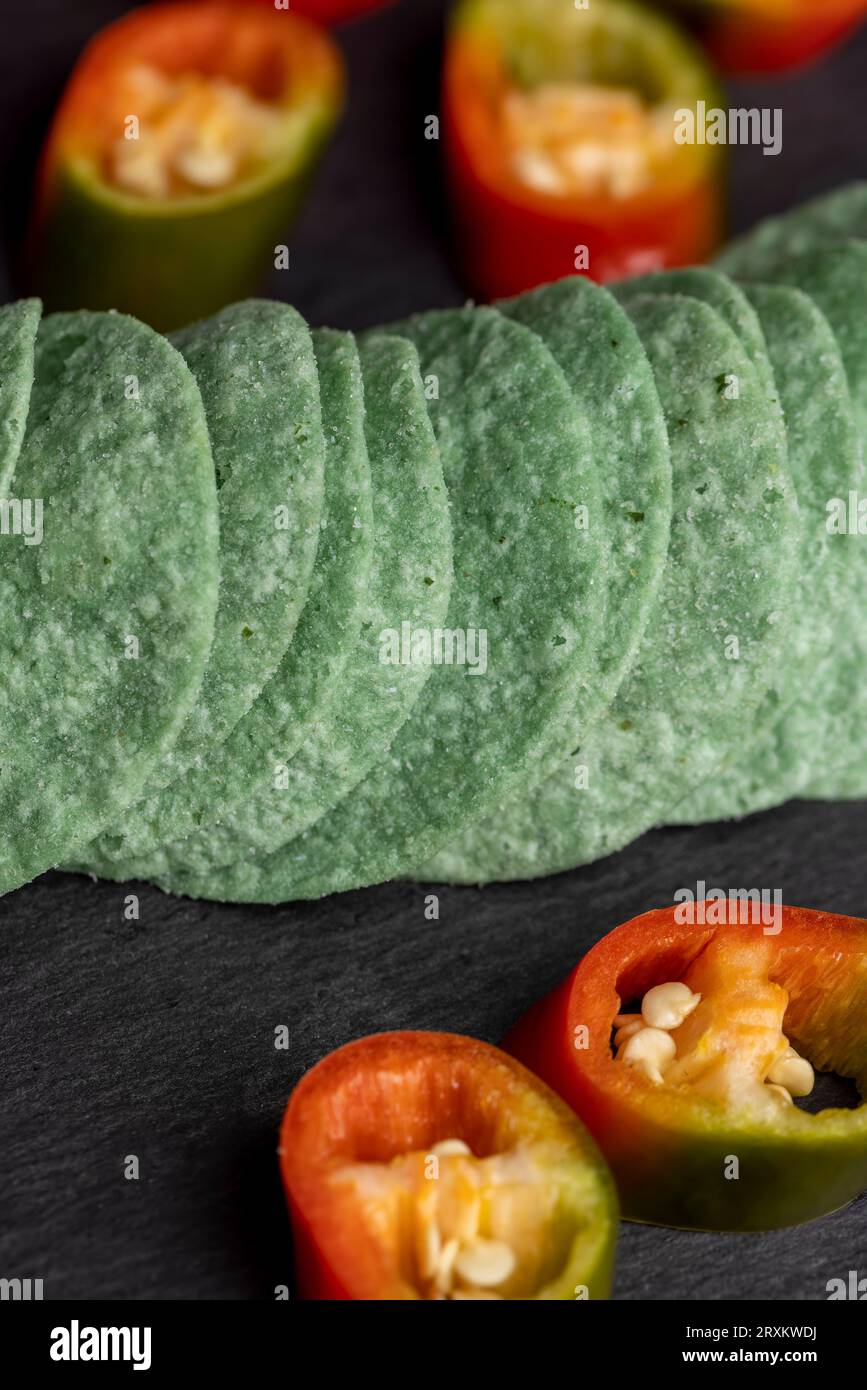 Thin and delicious green potato chips, crispy green chips with pepper
