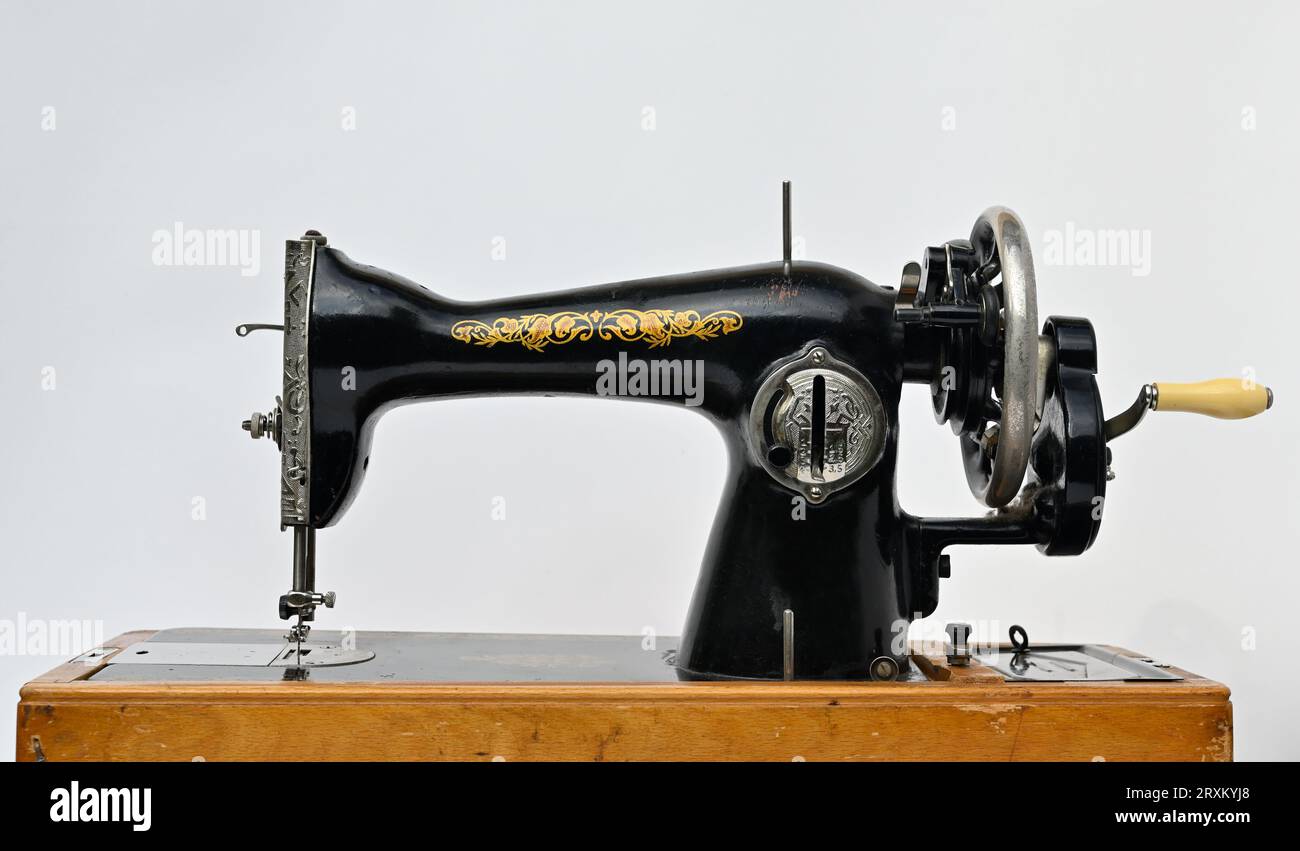 old vintage sewing machine on white background Stock Photo