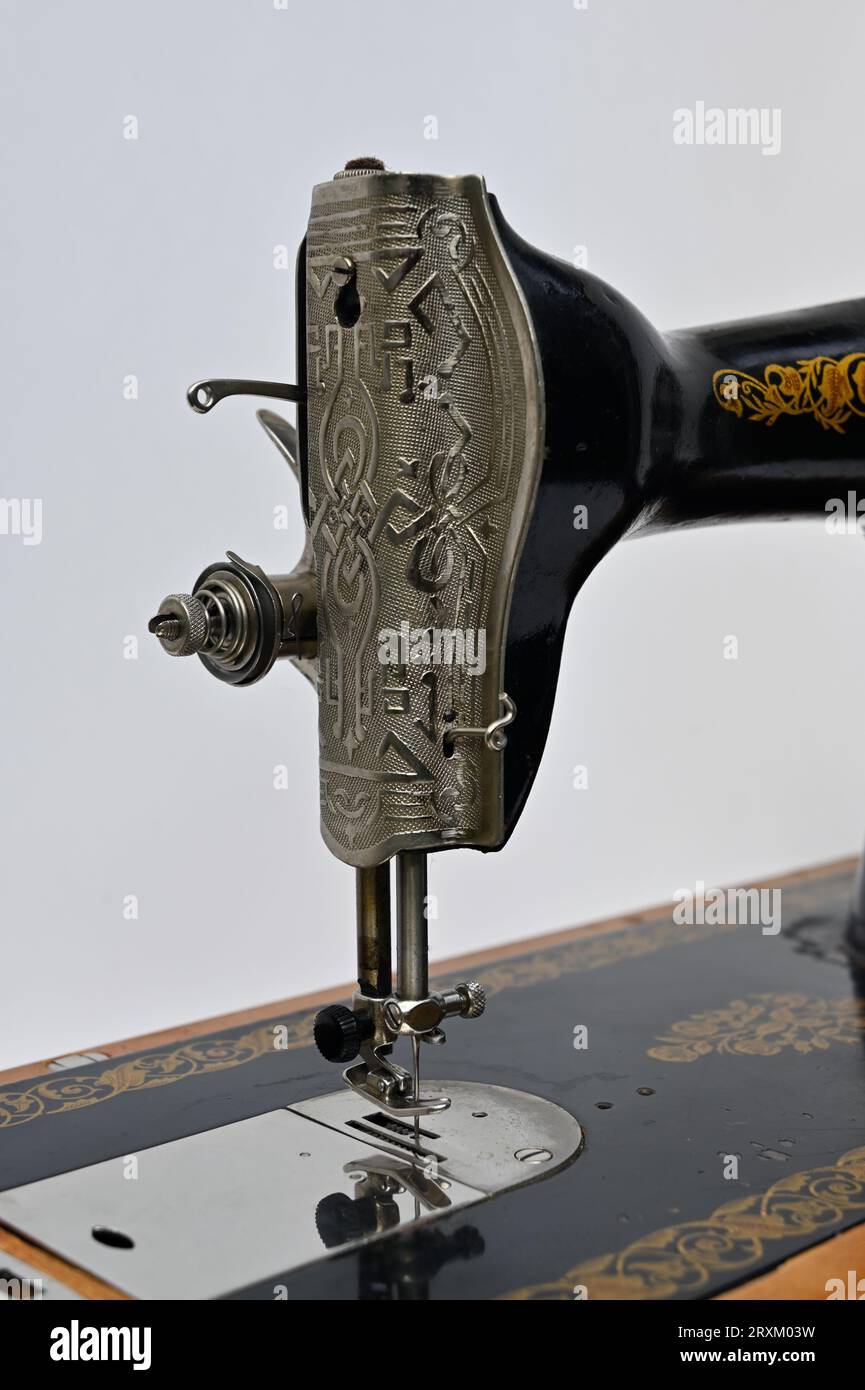 old vintage sewing machine on white background Stock Photo