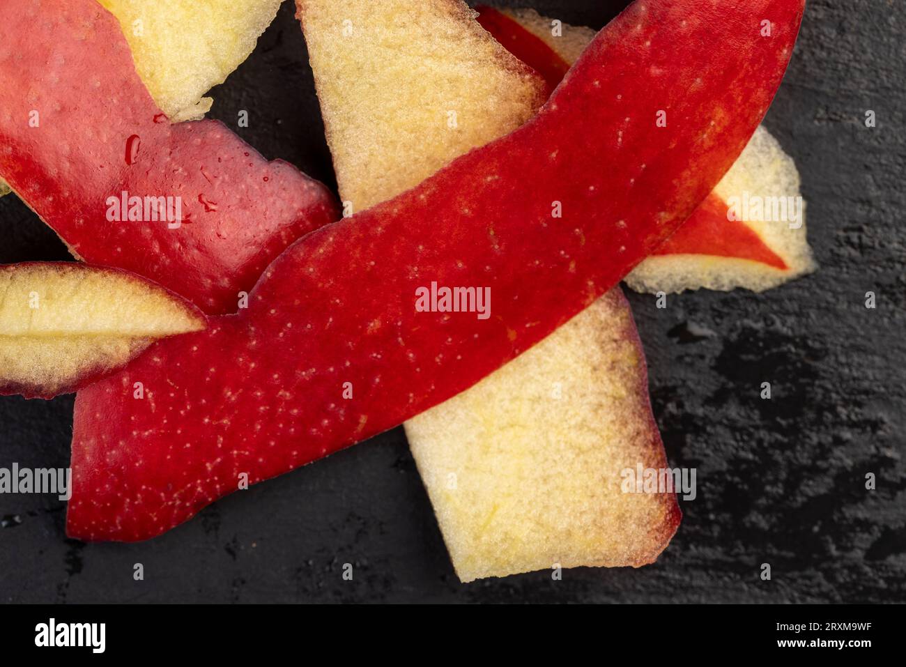 the flaccid peel of a peeled apple on the table, the peel of peeled