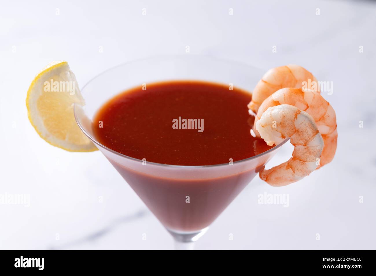 Shrimp cocktail on white marble background Stock Photo