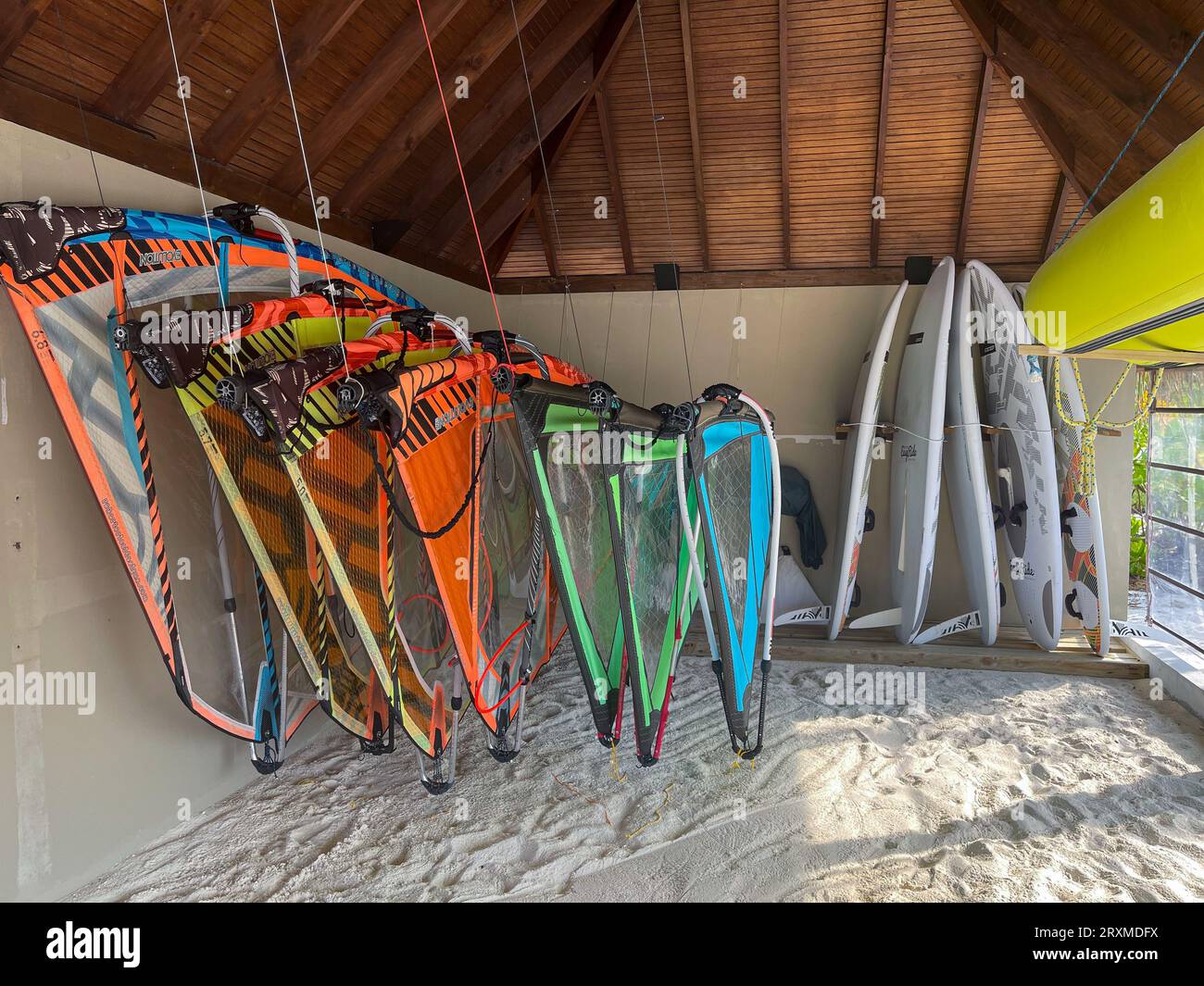 Fushifaru, Maldives - 2nd May, 2022 : Kite boarding equipment in storage for guests to rent at a luxury resort. Stock Photo