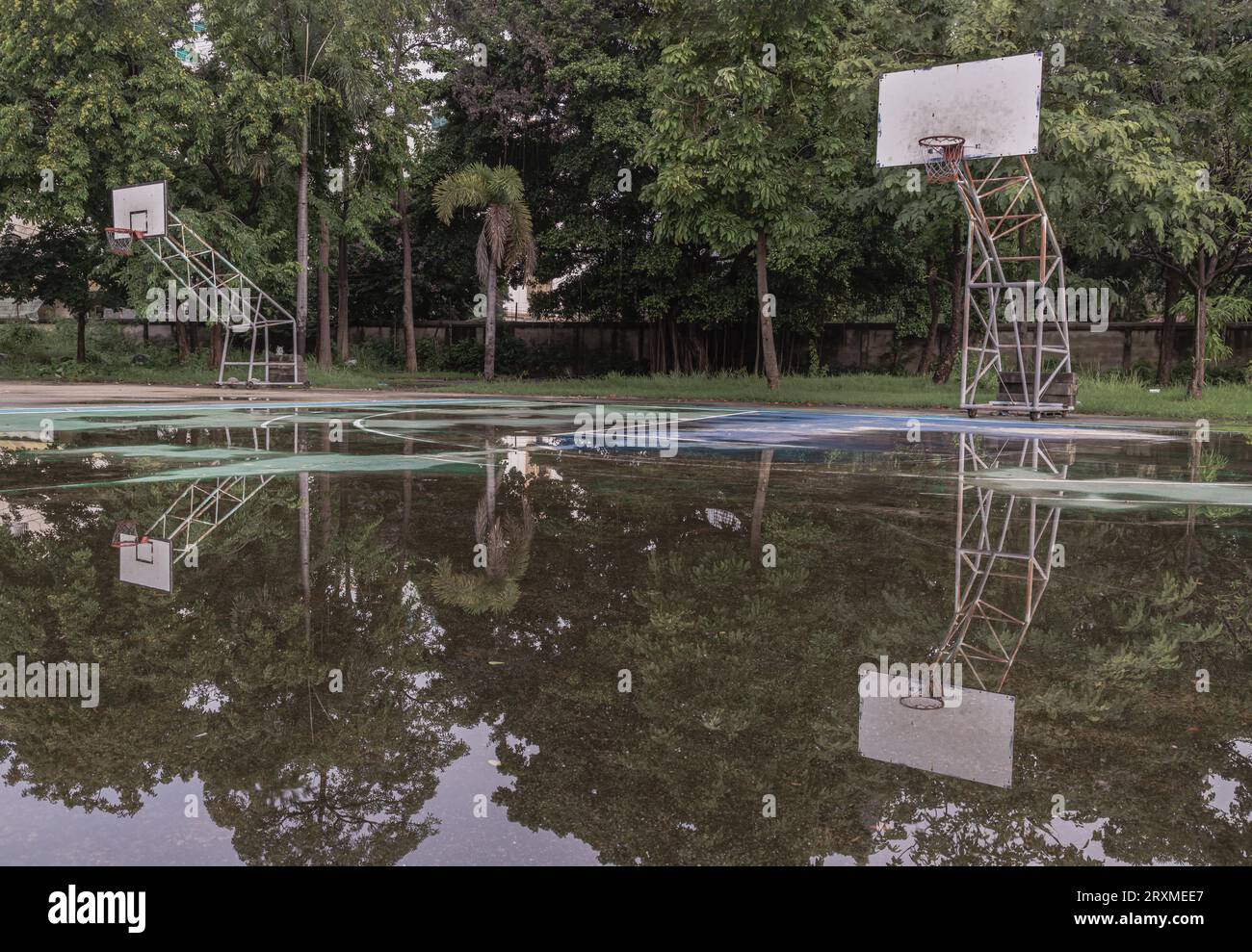 Two basketball wooden backboards with the hoop metal rings and the ...