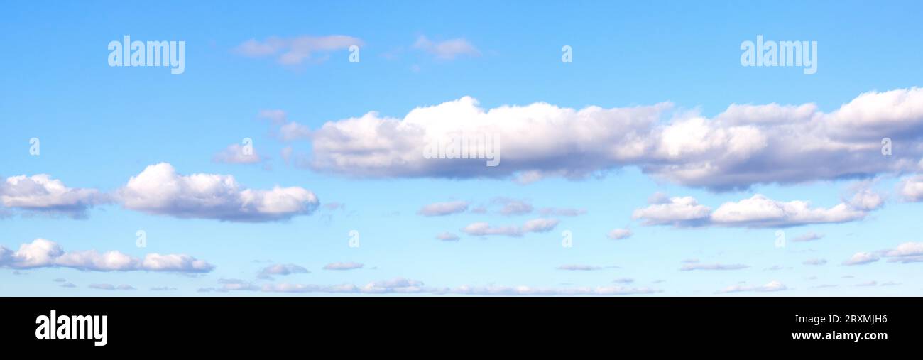 Blue sky with white clouds background panoramic image Stock Photo