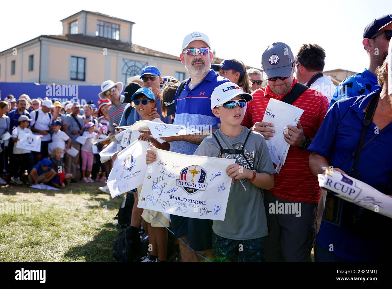 Fans wait for players to sign memorabilia at the Marco Simone Golf and Country Club, Rome, Italy, ahead of the 2023 Ryder Cup. Picture date: Tuesday September 26, 2023. Stock Photo