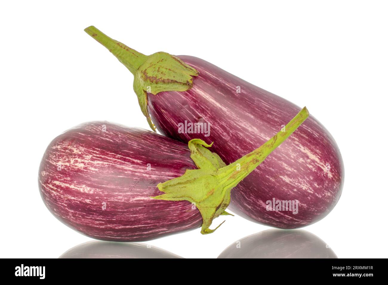 Two organic ripe eggplants, macro, isolated on white background. Stock Photo