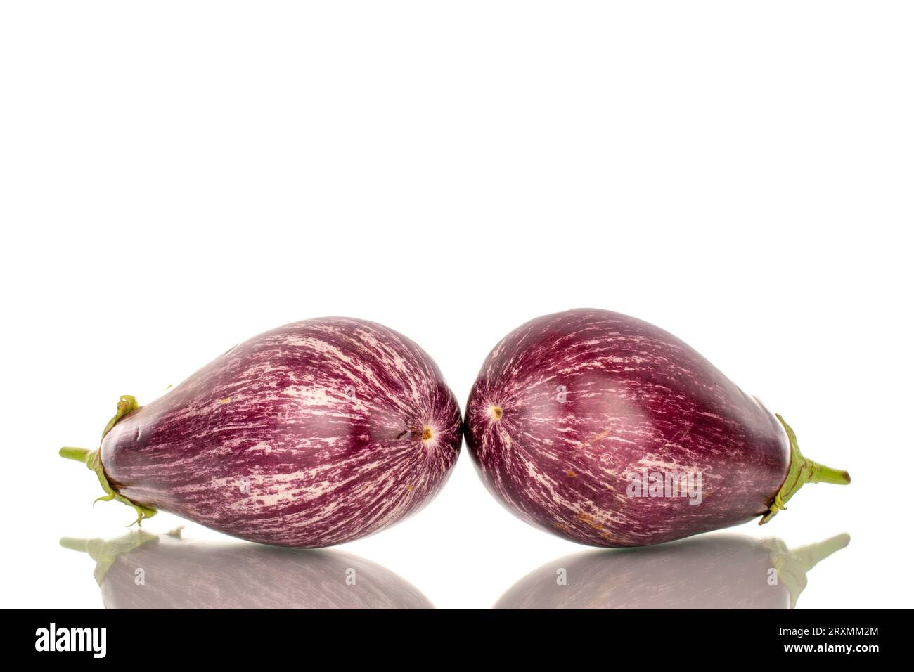Two organic ripe eggplants, macro, isolated on white background Stock