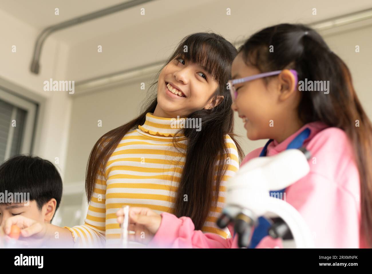 Children scientist doing science experiment test with chemistry in a ...