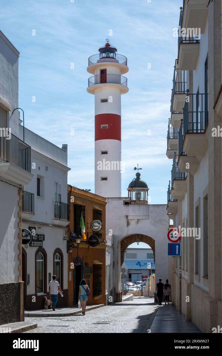 Rota, Cádiz, Spain - September 23, 2023: View of the called Arco del Mar (Arch of the Sea) and the lighthouse of Rota, a touristic town, located on th Stock Photo