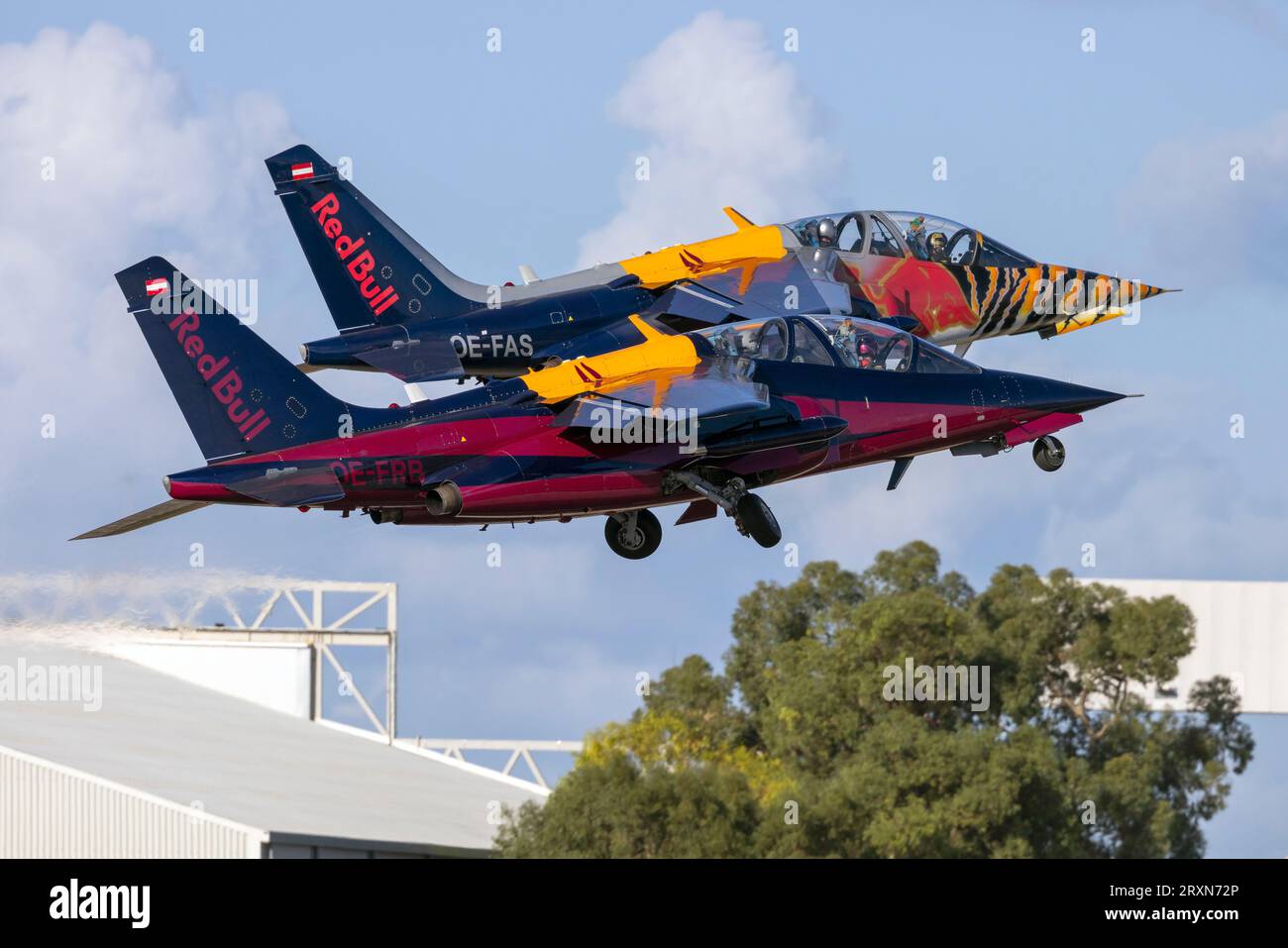 Red Bull (The Flying Bulls) Dassault-Dornier Alpha Jet A (Reg: OE-FAS OE-FRB) taking off from runway 31. Stock Photo
