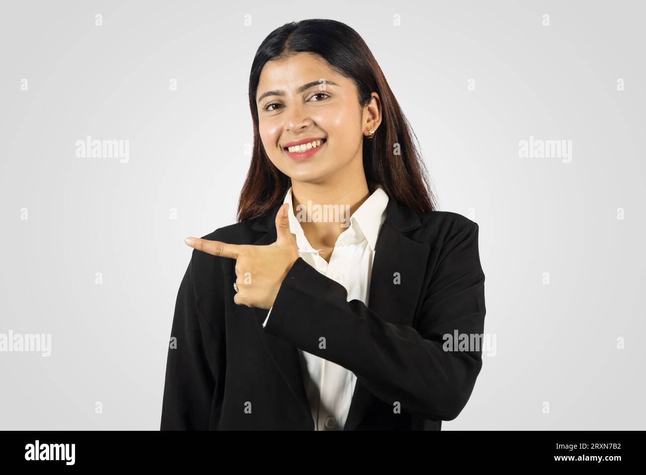 Beautiful and Happy Smiling Asian Young Girl from Nepal giving several  gestures in a formal dress Stock Photo - Alamy