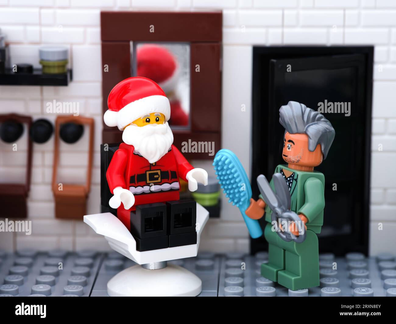 Tambov, Russian Federation - September 24, 2023 A Lego Santa Claus minifigure in a barber shop getting a haircut Stock Photo