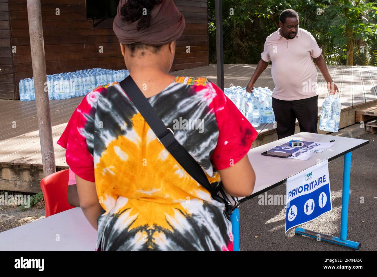 France. 21st Sep, 2023. Distribution point of 600,000 liters of bottled water from Martinique Island to the department's most vulnerable people in Dembeni on the French island of Mayotte on September 21, 2023. Photo by David Lemor/ABACAPRESS Credit: Abaca Press/Alamy Live News Stock Photo