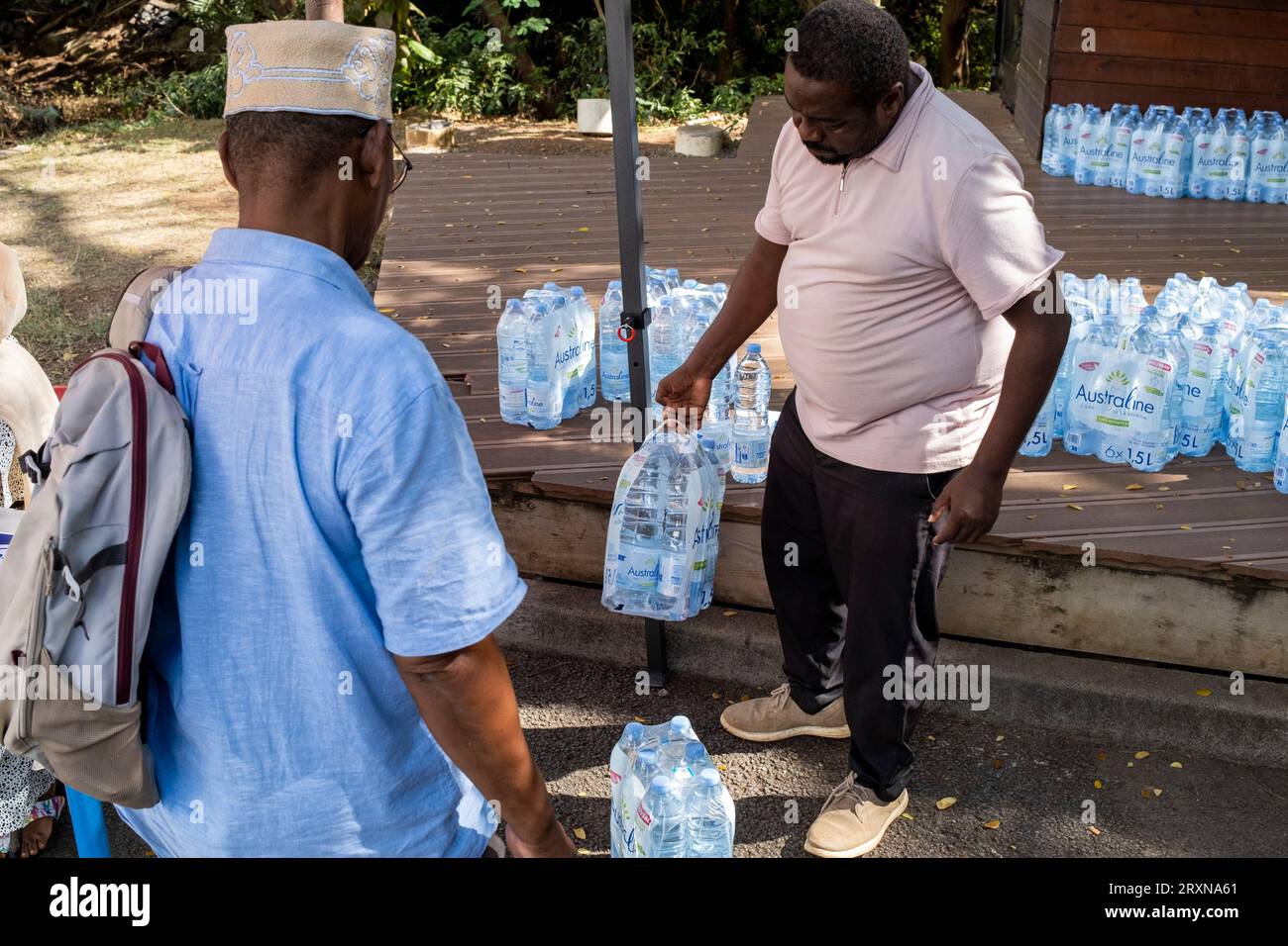 France. 22nd Sep, 2023. Distribution point of 600,000 liters of bottled water from Martinique Island to the department's most vulnerable people in Dembeni on the French island of Mayotte on September 21, 2023. Photo by David Lemor/ABACAPRESS Credit: Abaca Press/Alamy Live News Stock Photo
