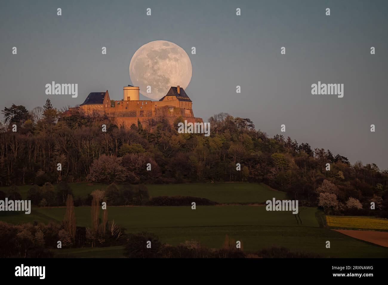 Full Moon behind Feste Otzberg Stock Photo