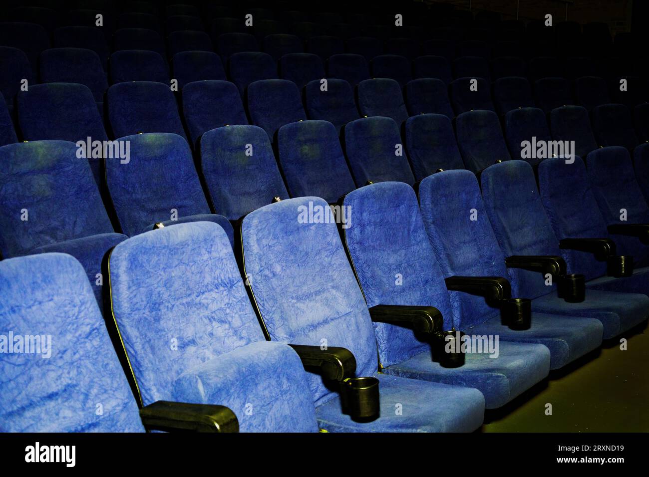 Modern cinema hall empty and blue comfortable seats, movie theater seats or chair. Stock Photo