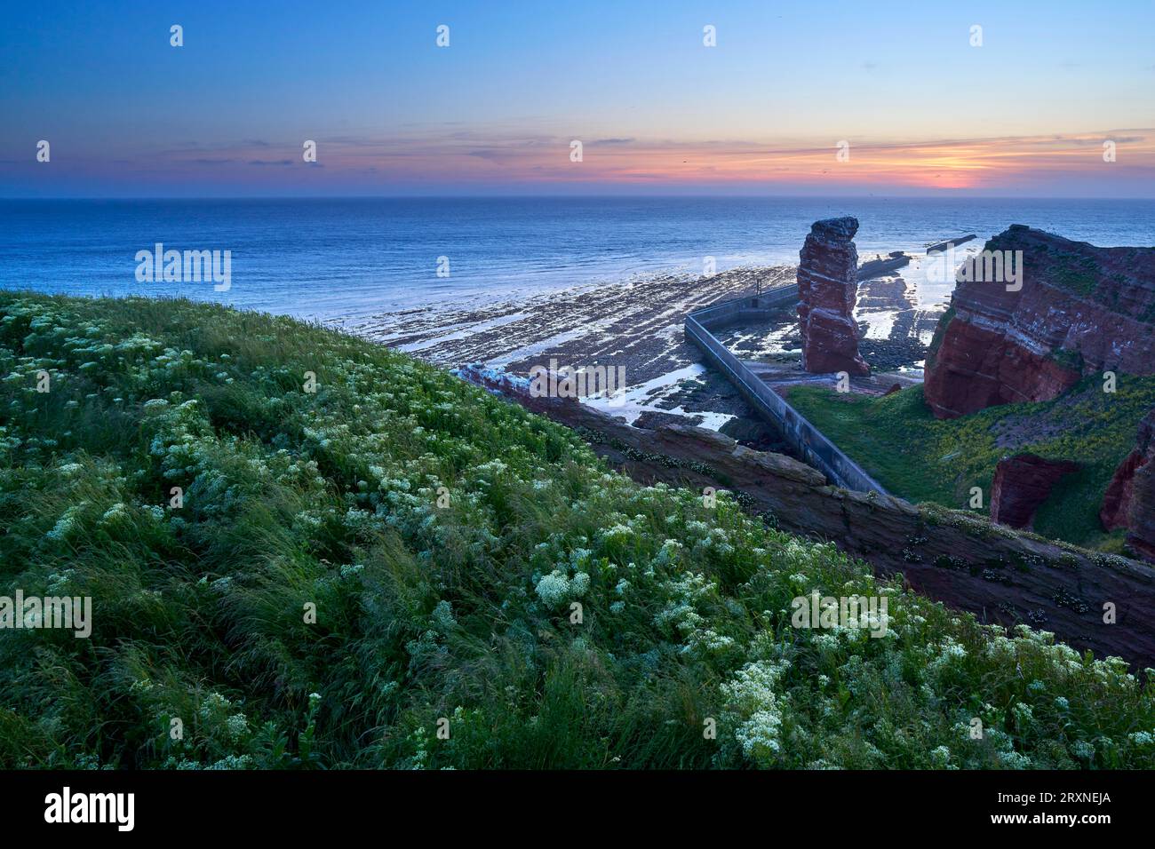 Lange Anna with cliffs on the high seas island of Helgoland, dusk, Helgoland, Pinneberg district, Schleswig-Holstein, Germany Stock Photo
