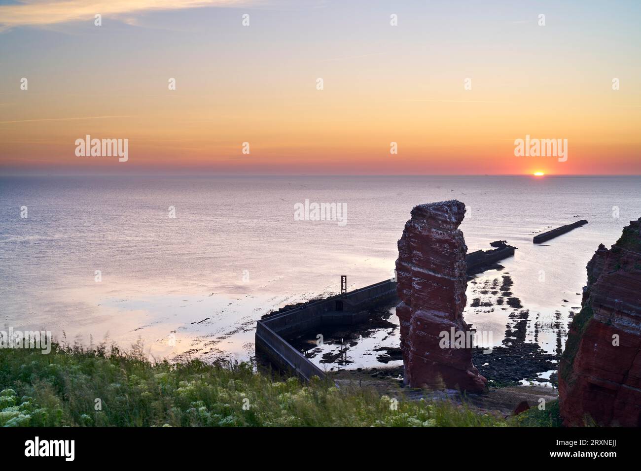 Lange Anna with cliffs on the high seas island of Helgoland, sunset, Helgoland, Pinneberg district, Schleswig-Holstein, Germany Stock Photo