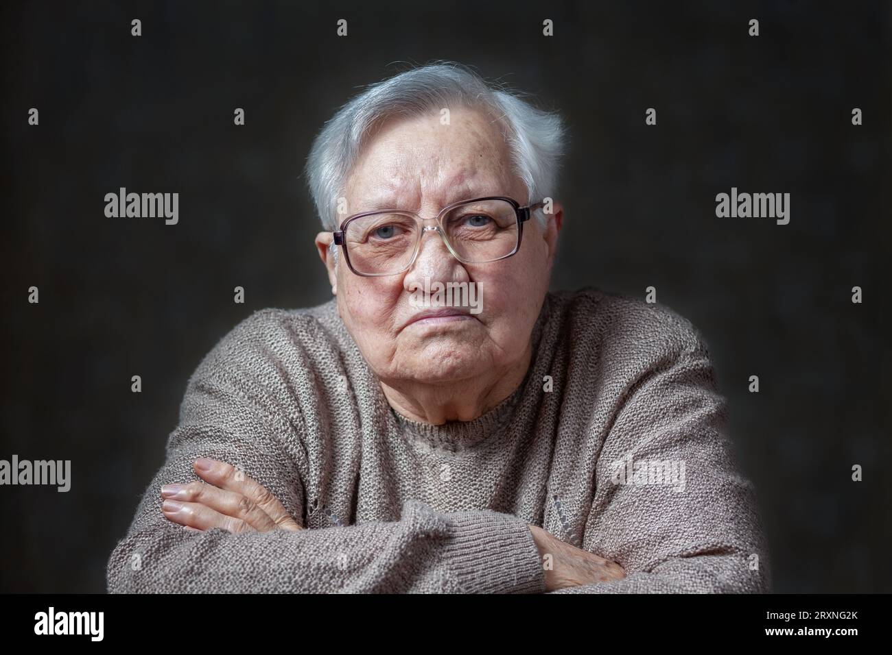Elderly woman grey hair sad hi-res stock photography and images - Alamy