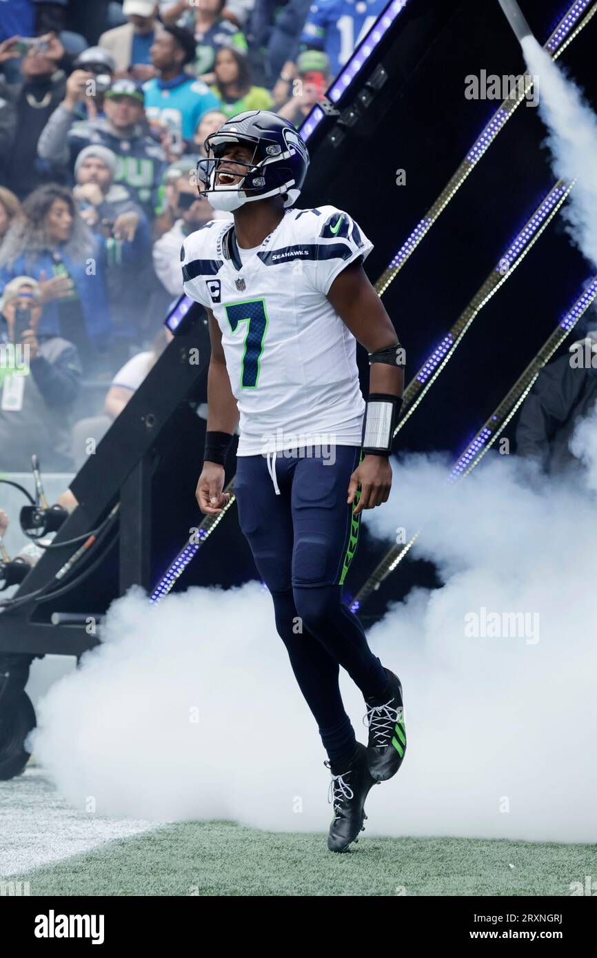 Seattle Seahawks quarterback Geno Smith (7) runs to the field during introductions before playing the Carolina Panthers in an NFL football game, Sunday, Sept. 24, 2023, in Seattle. (AP Photo/ John Froschauer) Stock Photo