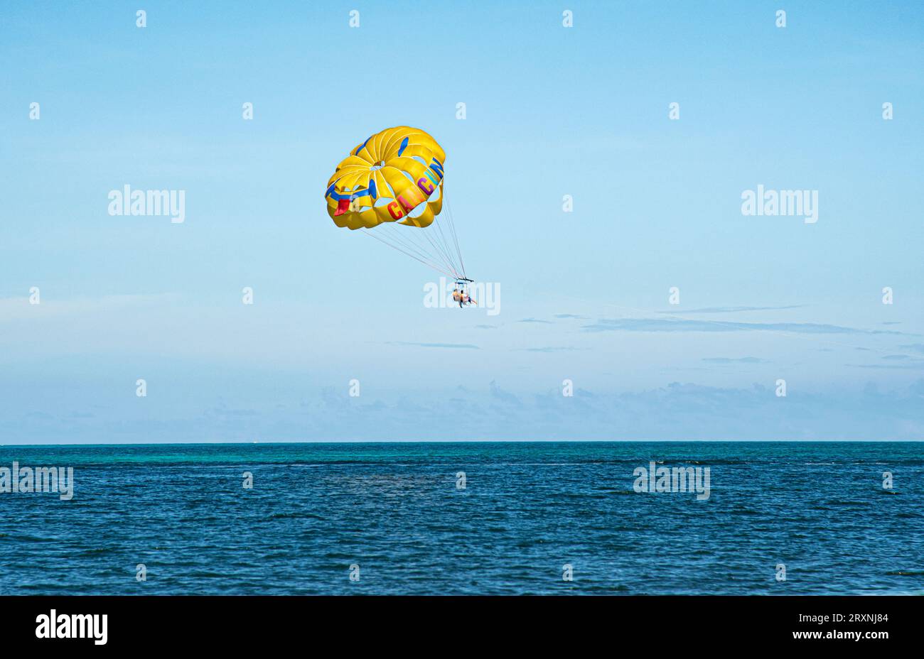 Paragliding sailing while vacationing in Cancun, Mexico. Stock Photo