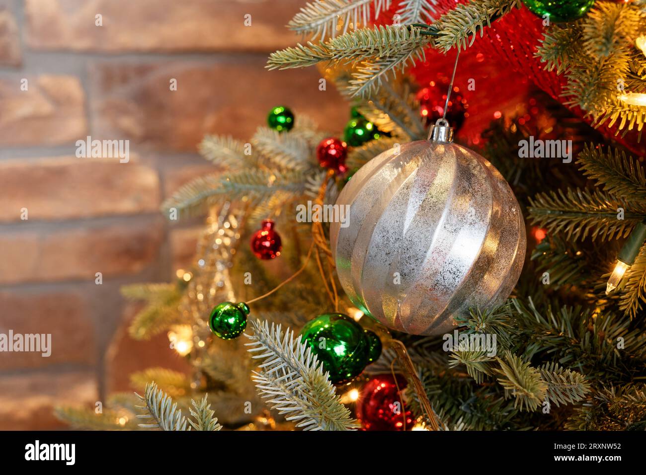soft focus Christmas background with red, green, and silver ball