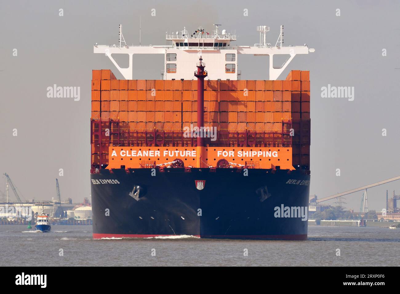 Hapag-Lloyd's new flagship BERLIN EXPRESS arrives at the river Elbe showing HL-only containers for the christening ceremony at the port of Hamburg Stock Photo